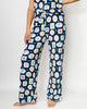 Navy blue pajama set with colorful abstract patterns on a white background
