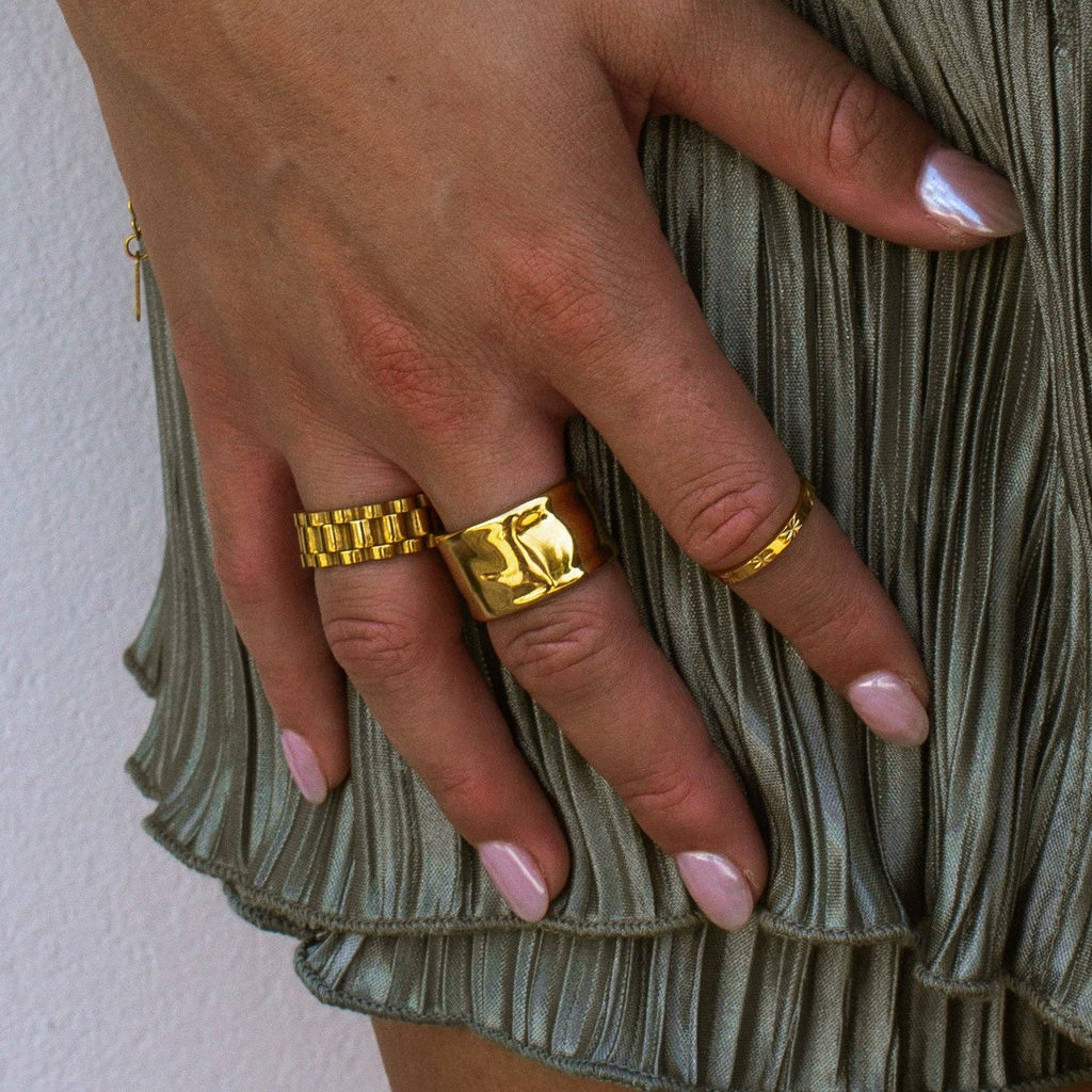 gold rings on fingers