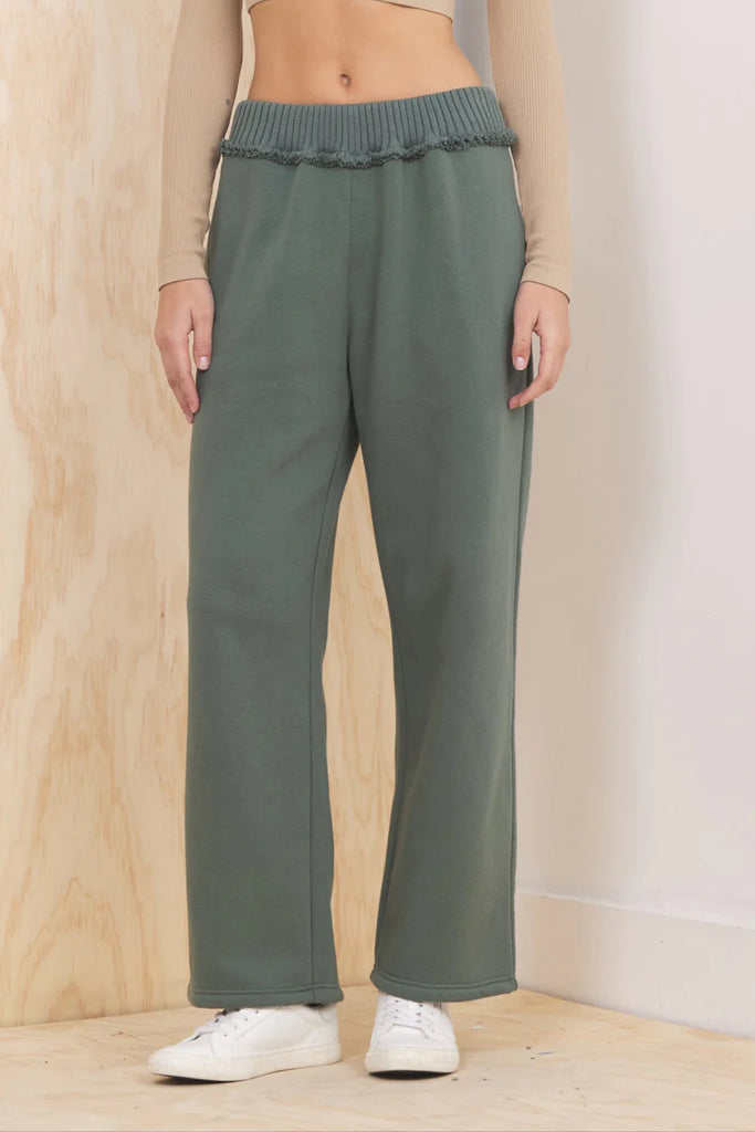 "Vintage Havana Olive Fleece Collared Quarter-Zip Pullover featuring a soft fleece fabric, ribbed accents, and relaxed silhouette for elevated lounge and athleisure styling."