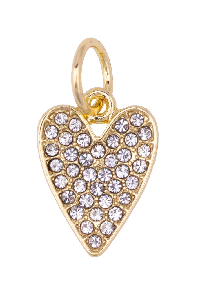 Gold heart-shaped pendant with clear stones on a white background