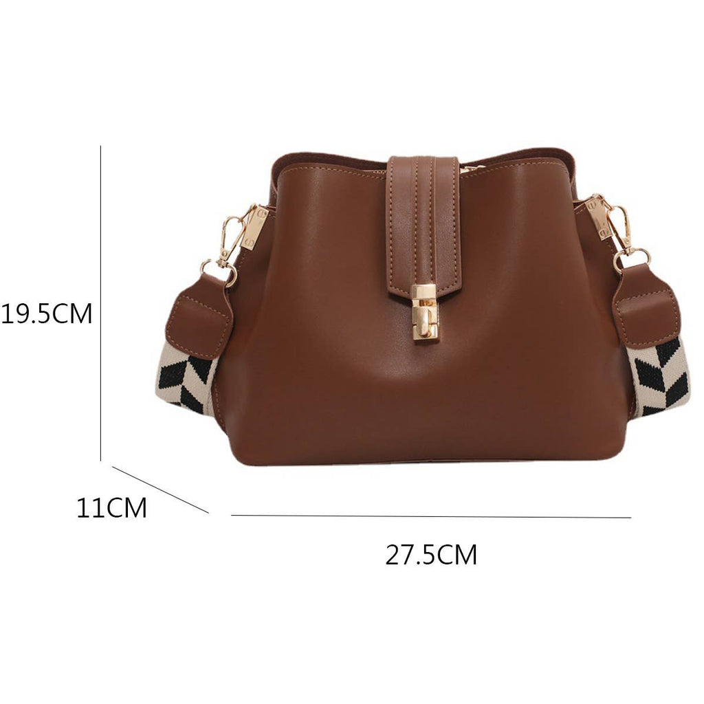 Brown handbag with measurements on a white background