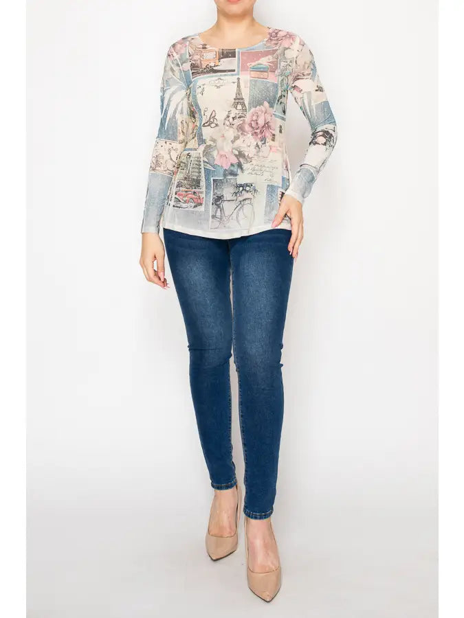 "Women’s sparkly sheer mesh long sleeve top with Paris-inspired collage print, soft pastel tones, floral accents, and subtle shimmer — boutique romantic layering blouse"