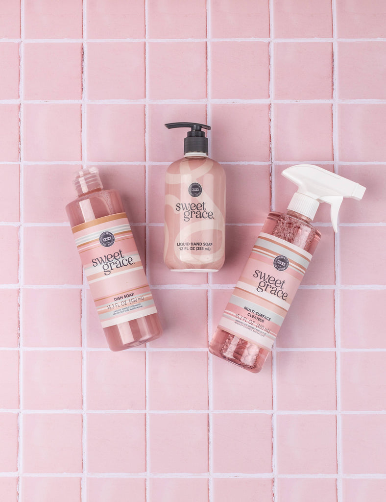 Three 'sweet grace' products on a pink tiled background