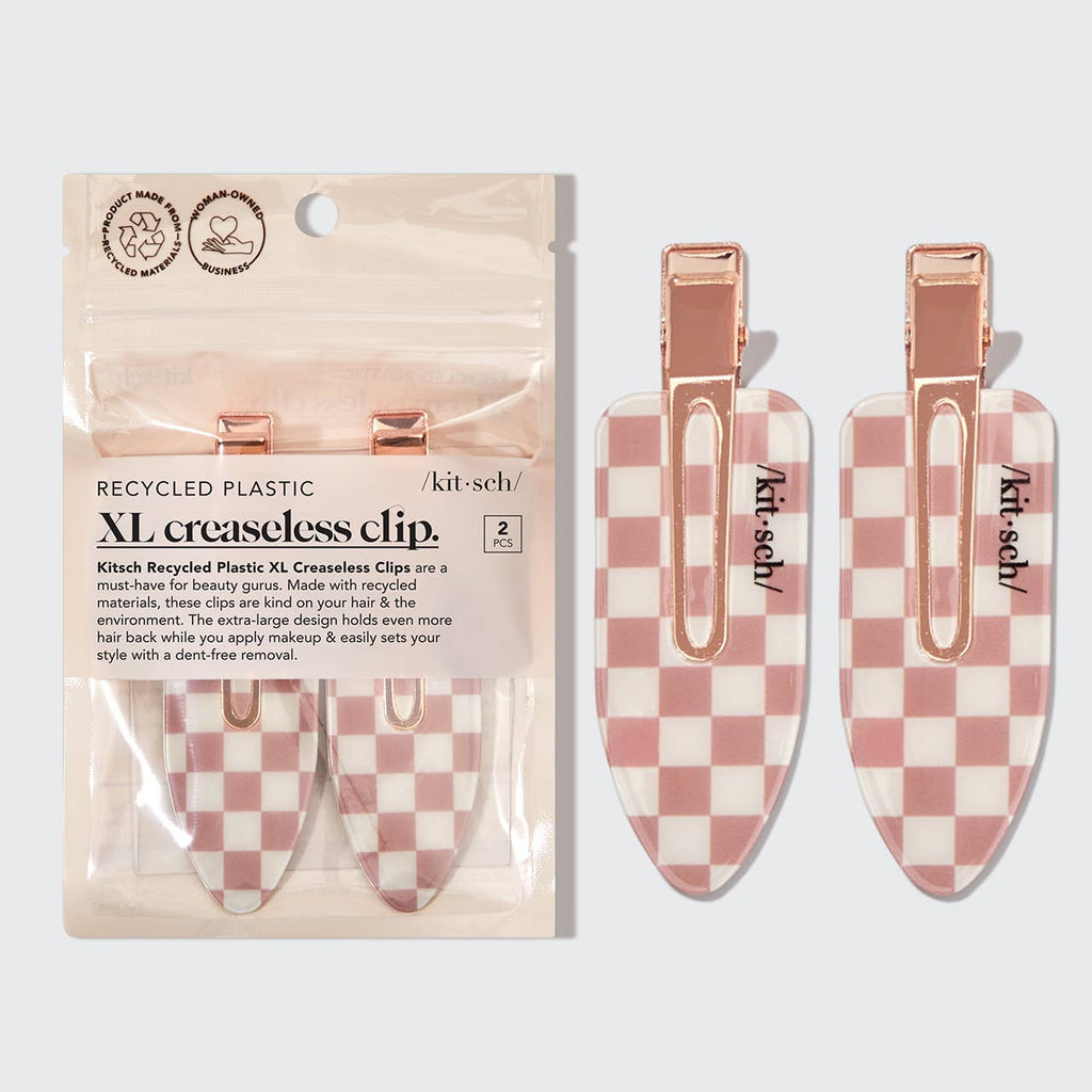 Checkered hair clips with packaging on a light gray background