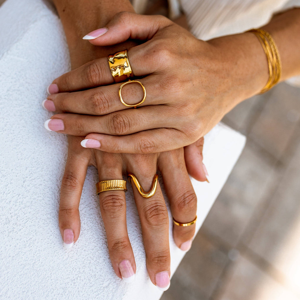 gold rings on fingers
