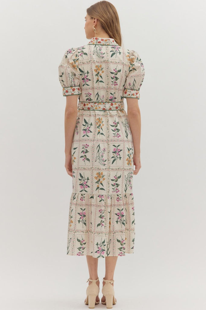 Floral print midi dress with short puff sleeves, button front closure, contrast binding, removable belt, and side pockets