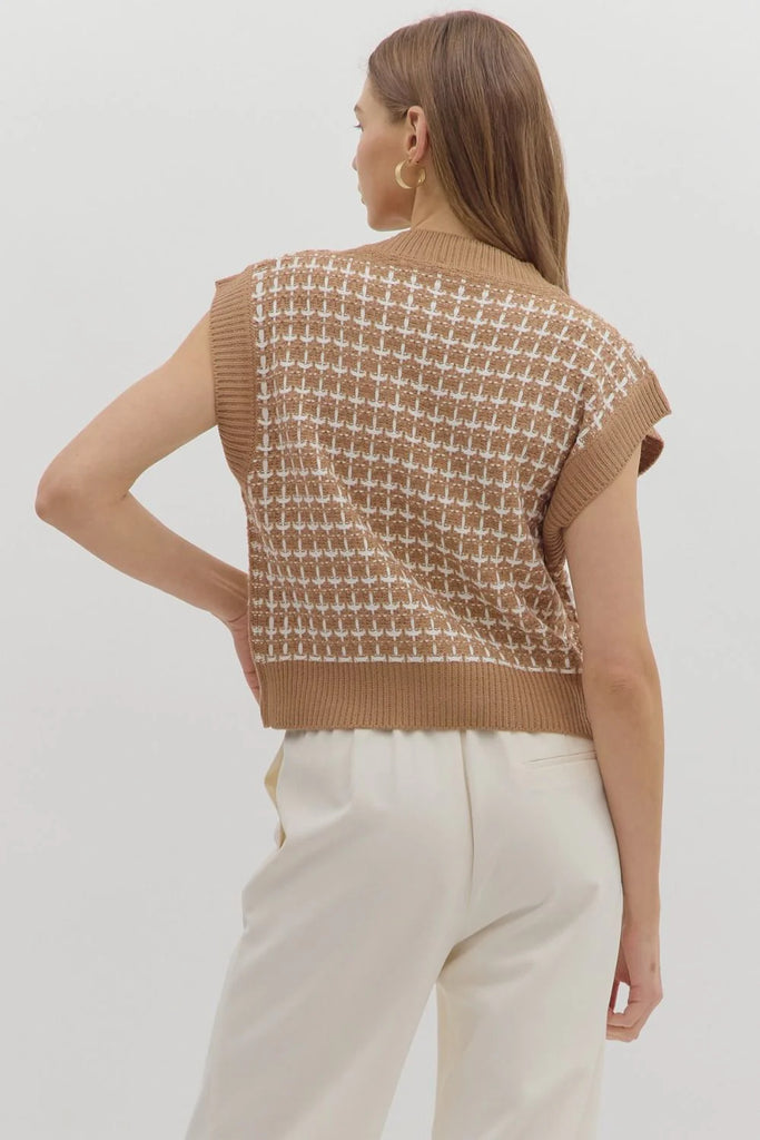 Taupe knit vest with white textured stitching, button-front closure, and front pockets.