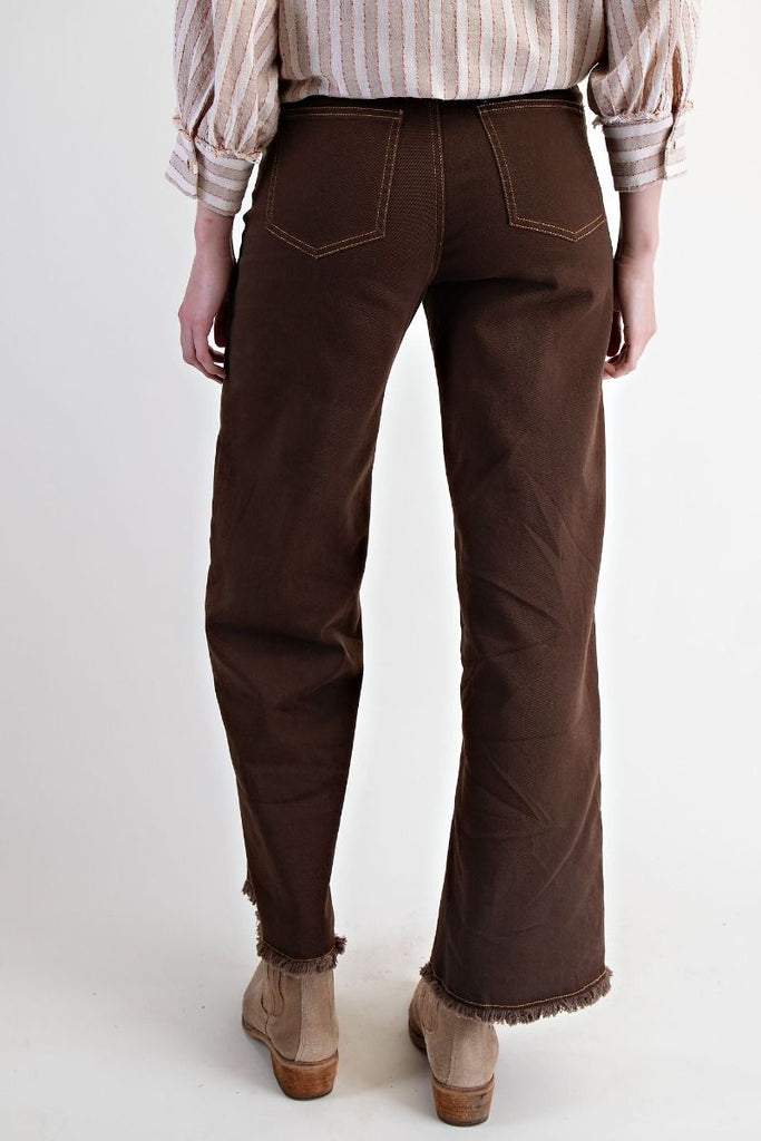 Coffee brown high-waisted straight-leg washed twill pants with raw frayed hem, five-pocket design, and button-zip fly