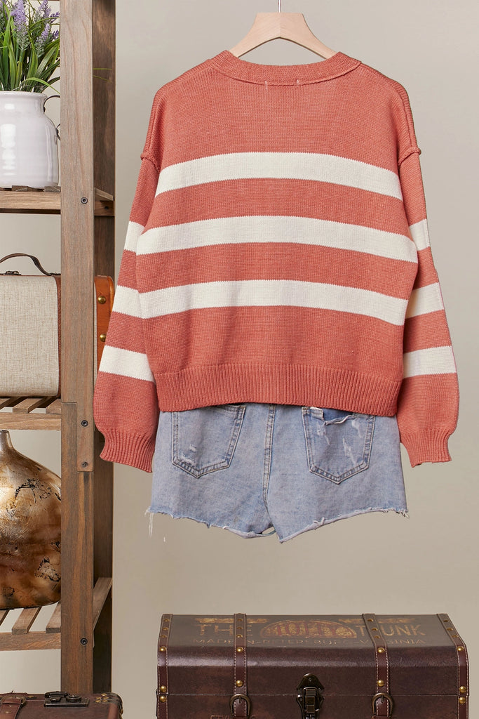 Rust and cream striped button-front cardigan with relaxed fit and ribbed details