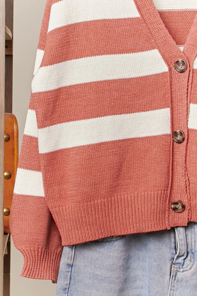 Rust and cream striped button-front cardigan with relaxed fit and ribbed details