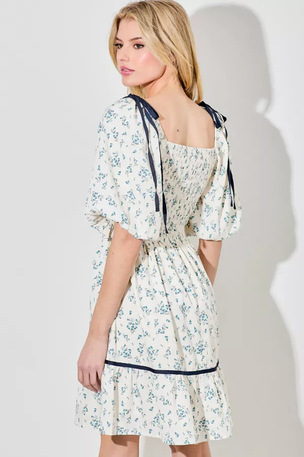 Side and back view of mini  bubble dress