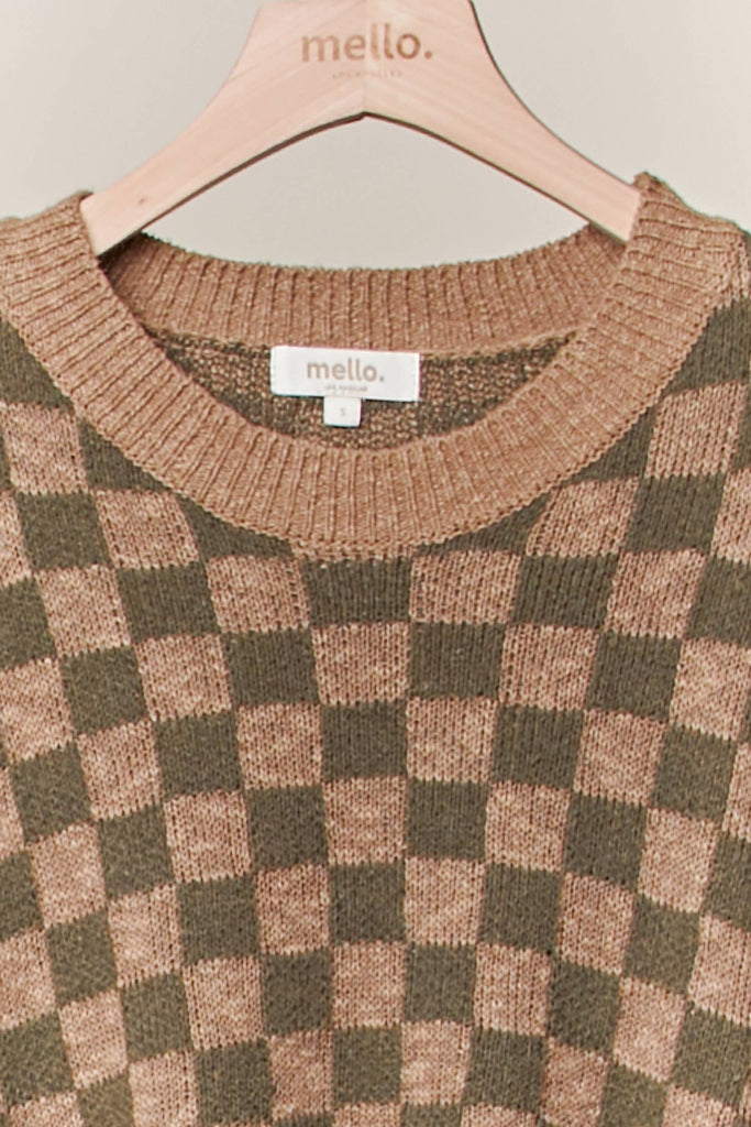 Olive and taupe checker-pattern knit sweater with relaxed fit and ribbed trim.