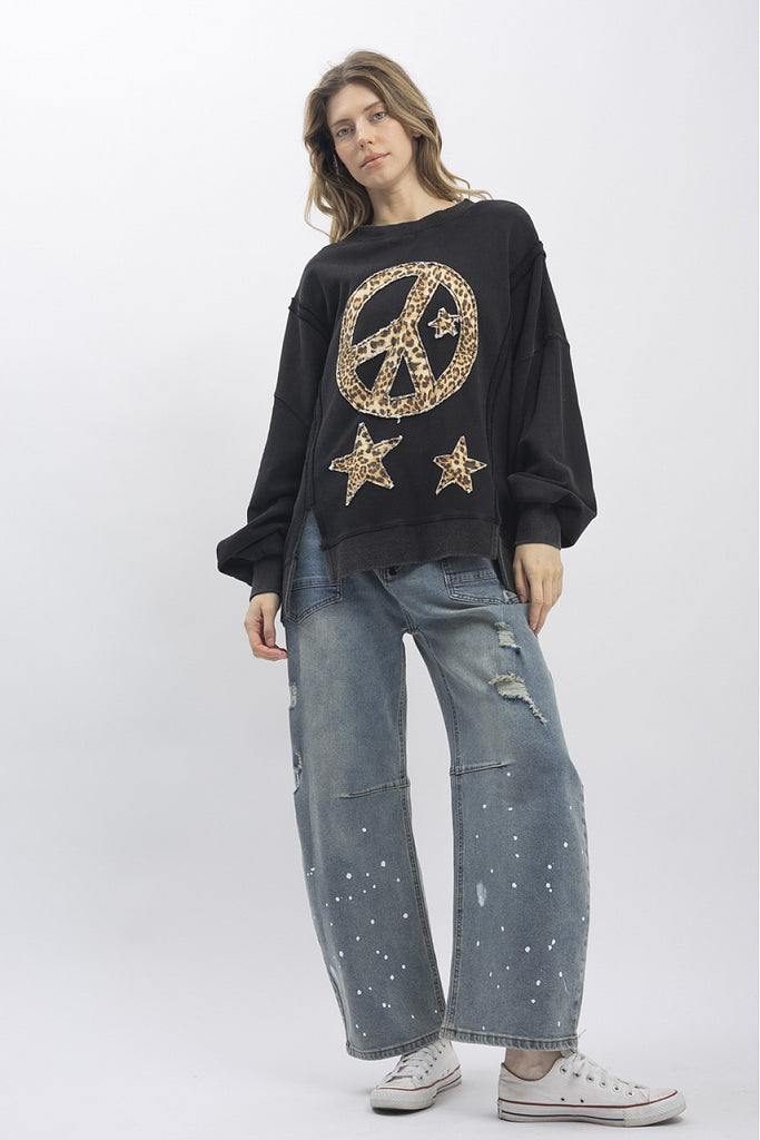 Euphemia leopard peace sign sweatshirt in washed black with a large animal print graphic, a relaxed fit, and distressed raw hem.