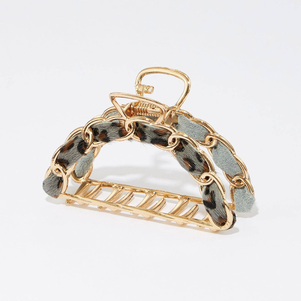 Gold chain claw clip with genuine calf hair animal print accents.