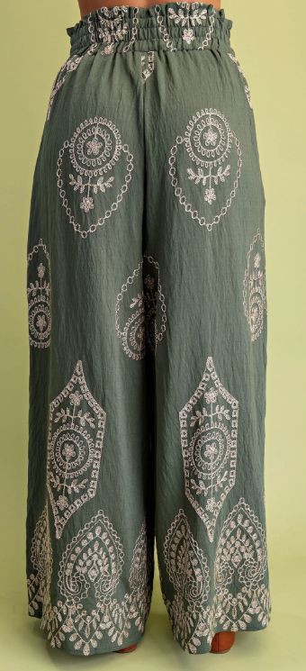 Olive wide-leg pants with metallic embroidery, smocked drawstring waistband, and side pockets