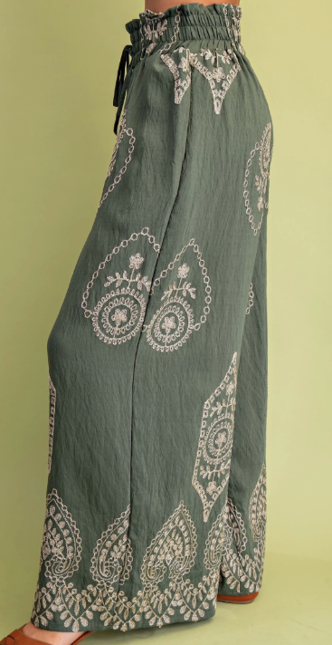 Olive wide-leg pants with metallic embroidery, smocked drawstring waistband, and side pockets