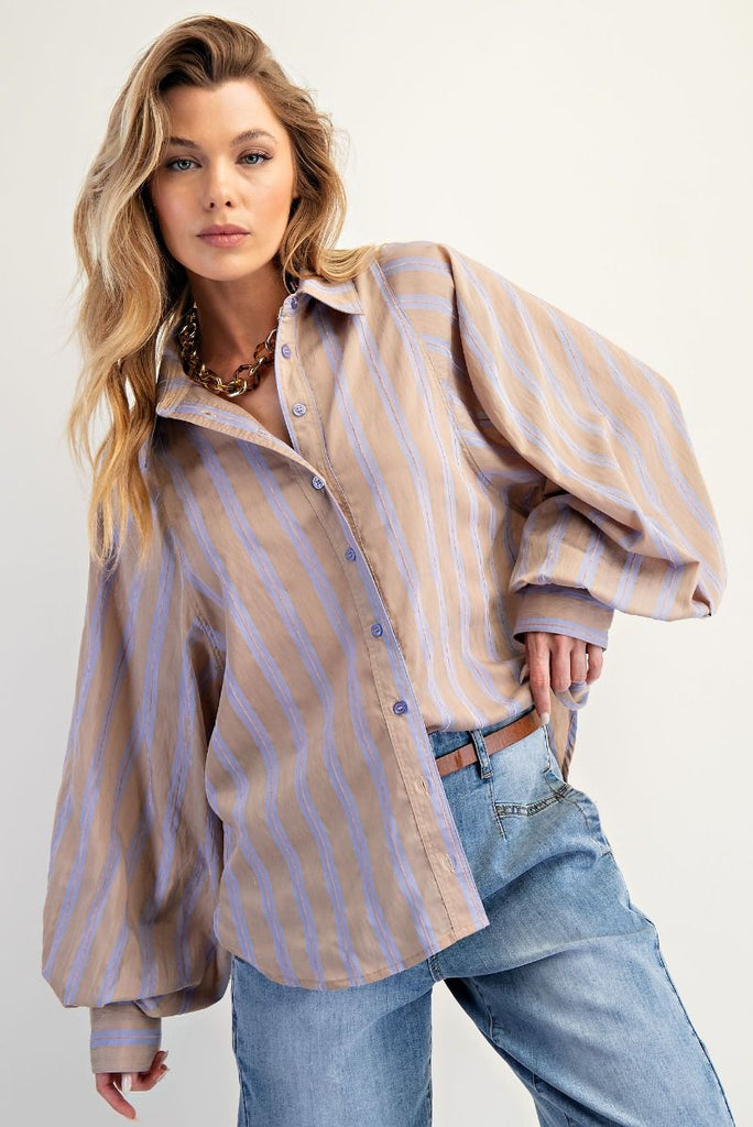 A mushroom-colored oversized button-down shirt with light blue yarn-dyed stripes. The shirt has a collar, a button front, and dramatic long balloon sleeves.