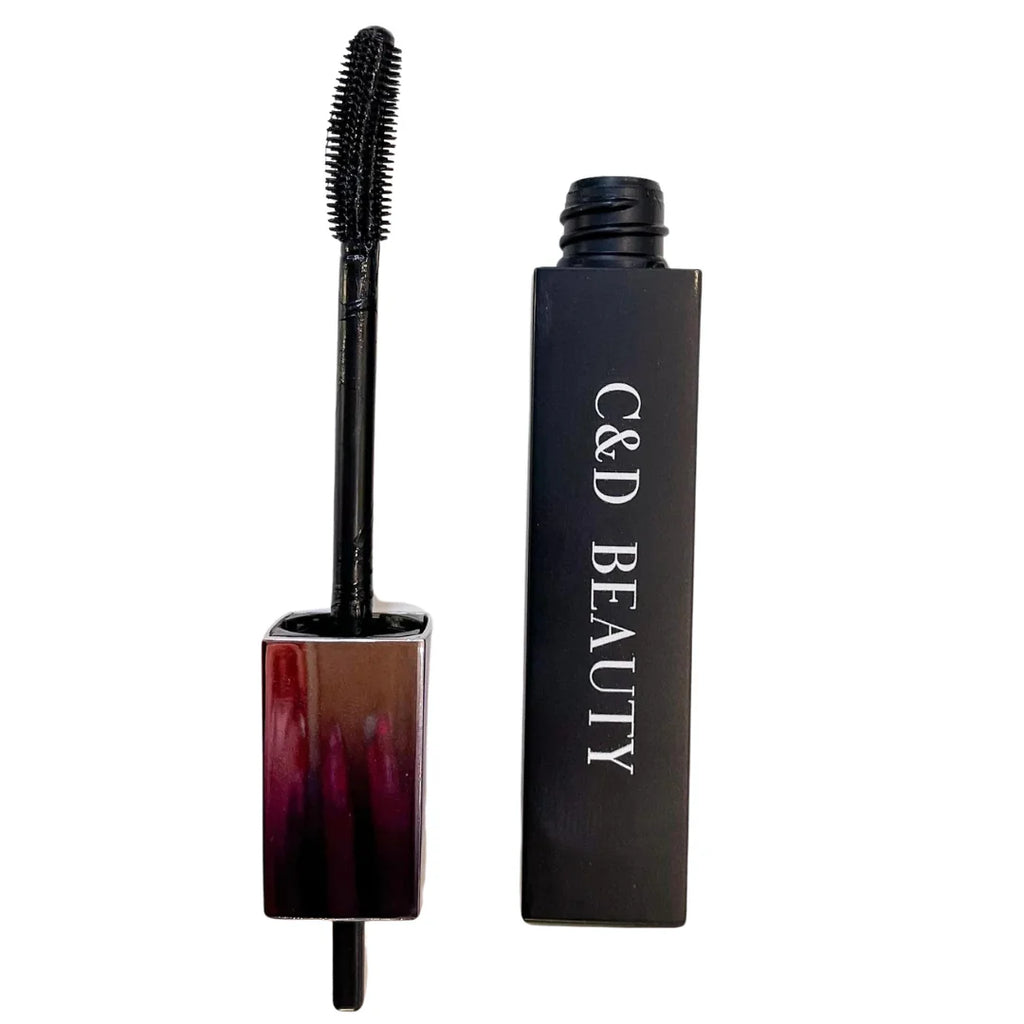 Mascara with black wand and black casing labeled 'C&D Beauty' on a white background