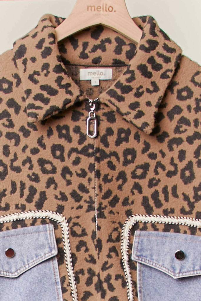Brown leopard knit zip-up jacket with oversized denim patch pockets and ribbed trim.