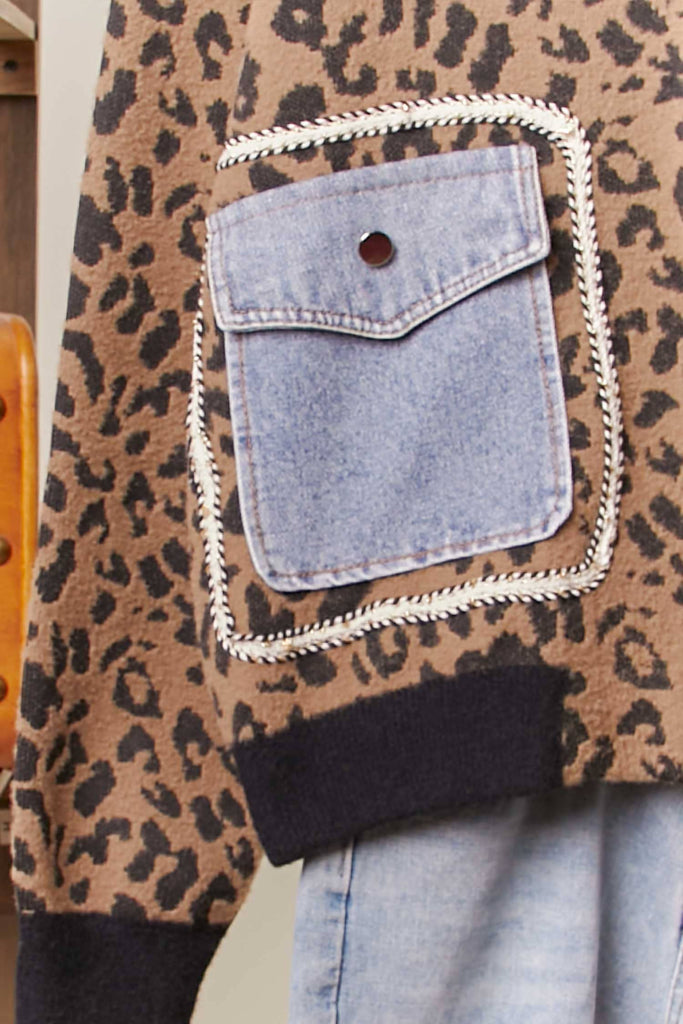Brown leopard knit zip-up jacket with oversized denim patch pockets and ribbed trim.