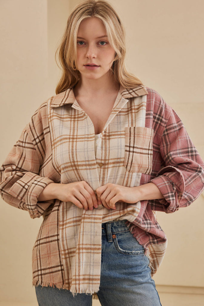 Oversized multi-plaid shacket in beige, cream, and blush with raw-edge hem and chest pocket.