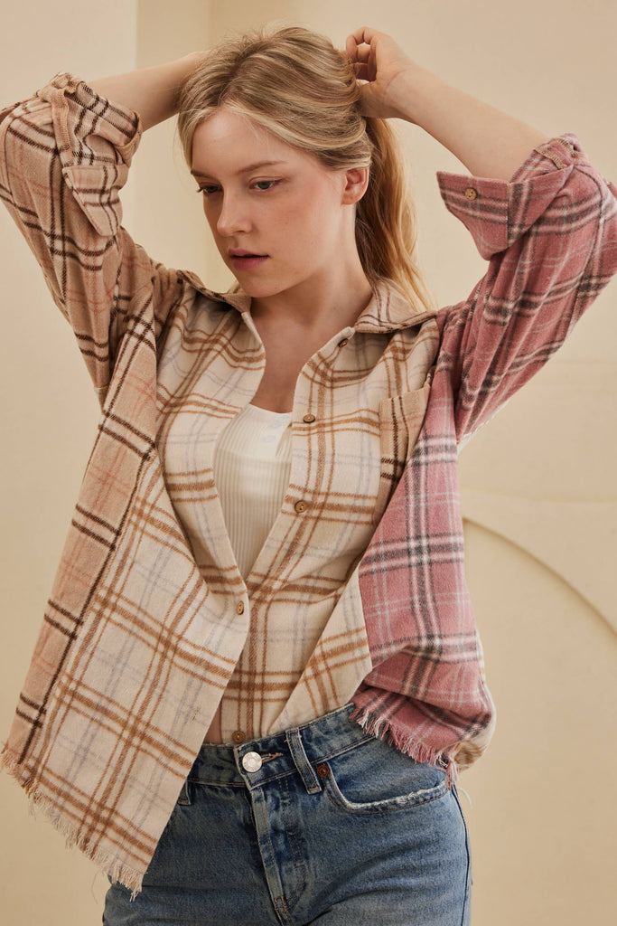 Oversized multi-plaid shacket in beige, cream, and blush with raw-edge hem and chest pocket.