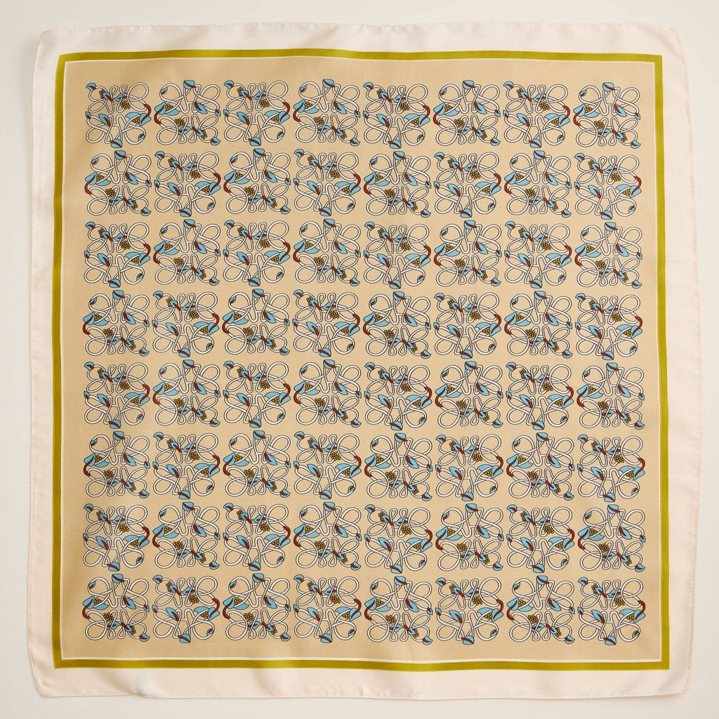 Beige geometric patterned square scarf with silky texture and decorative border.