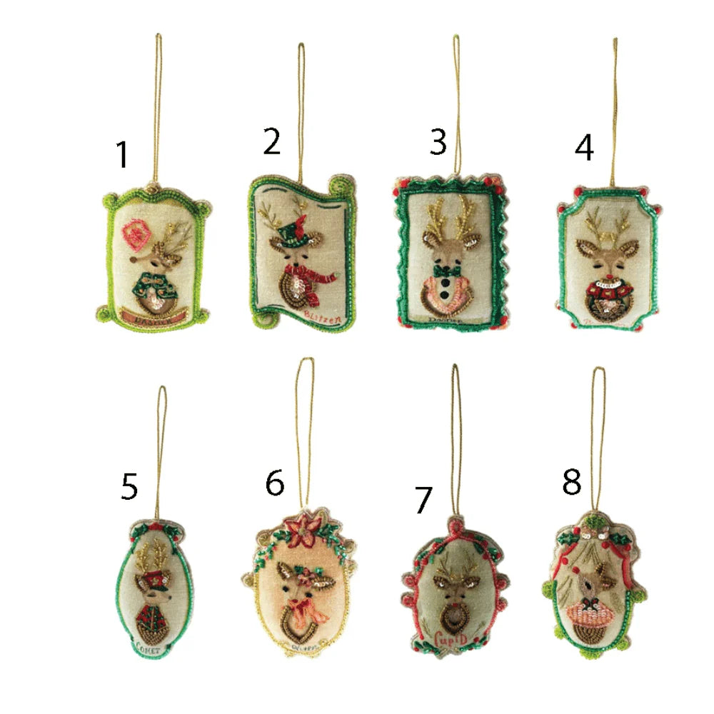 Set of eight embroidered cotton reindeer ornaments, each with vintage-inspired designs, gold hanging loop, and beaded trim. Sold individually.