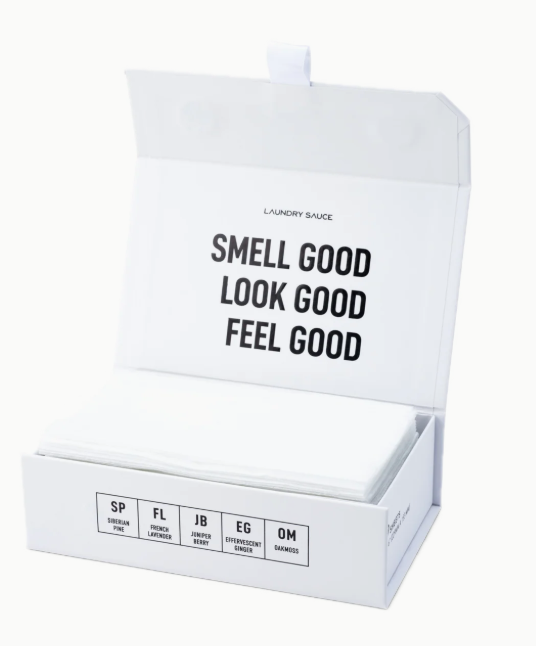 White box of laundry sauce with text 'Smell Good Look Good Feel Good' on a white background