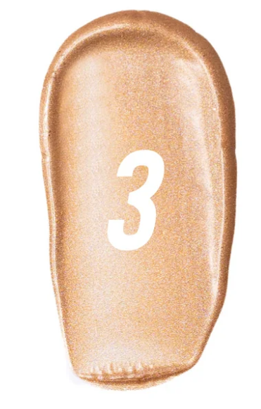 Bronze-colored makeup product with the number 3 on a white background