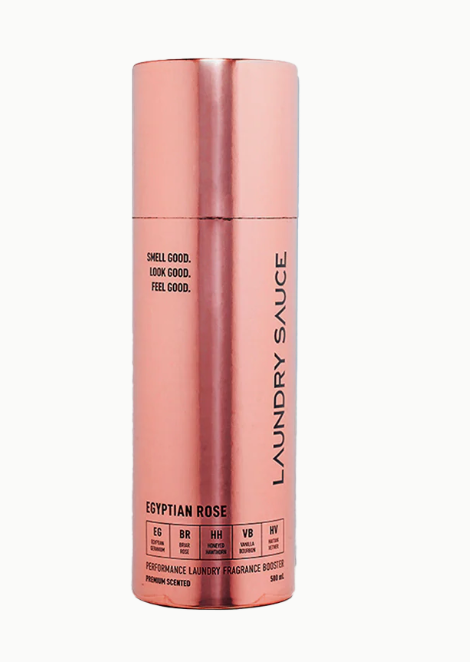 Rose gold bottle of Laundry Sauce with 'Egyptian Rose' fragrance on a white background