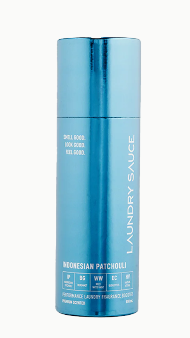 Blue bottle of Laundry Sauce with text on a white background