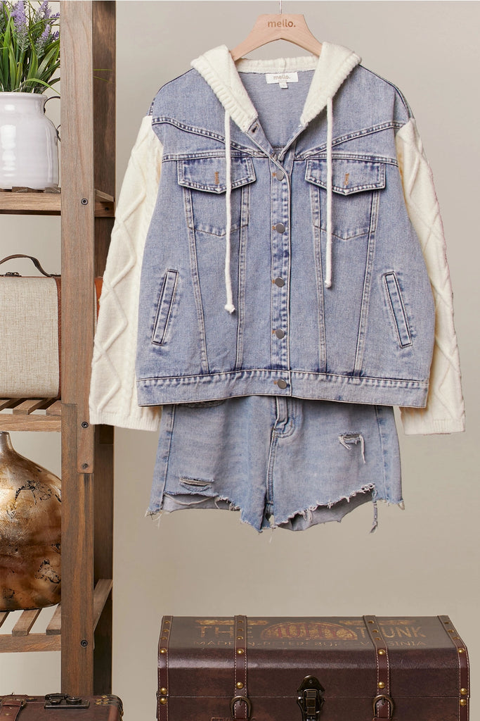 Seraphina knit sleeve denim jacket from Mello, featuring a light wash denim body with an attached knit hood and cream-colored cable-knit sleeves