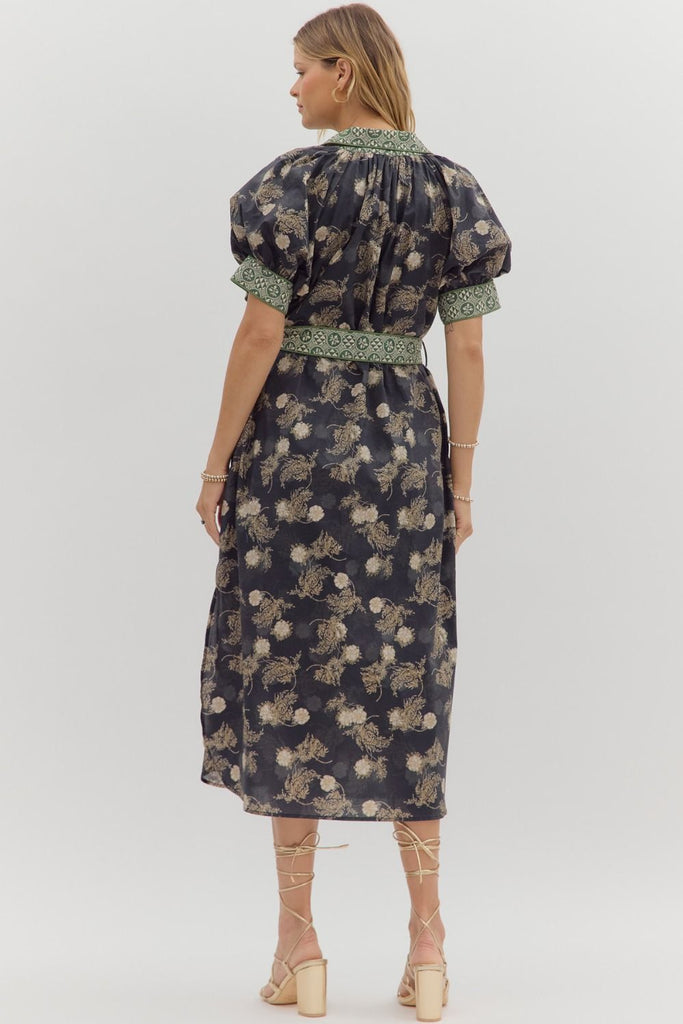 Navy floral midi shirt dress with short puff sleeves, front button closure, removable belt, contrast collar, and side pockets
