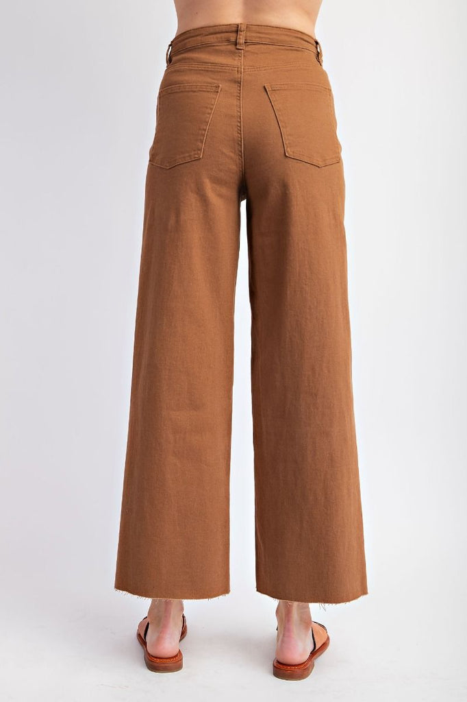 A pair of coffee-colored, high-waisted, wide-leg twill pants with a soft stretch.