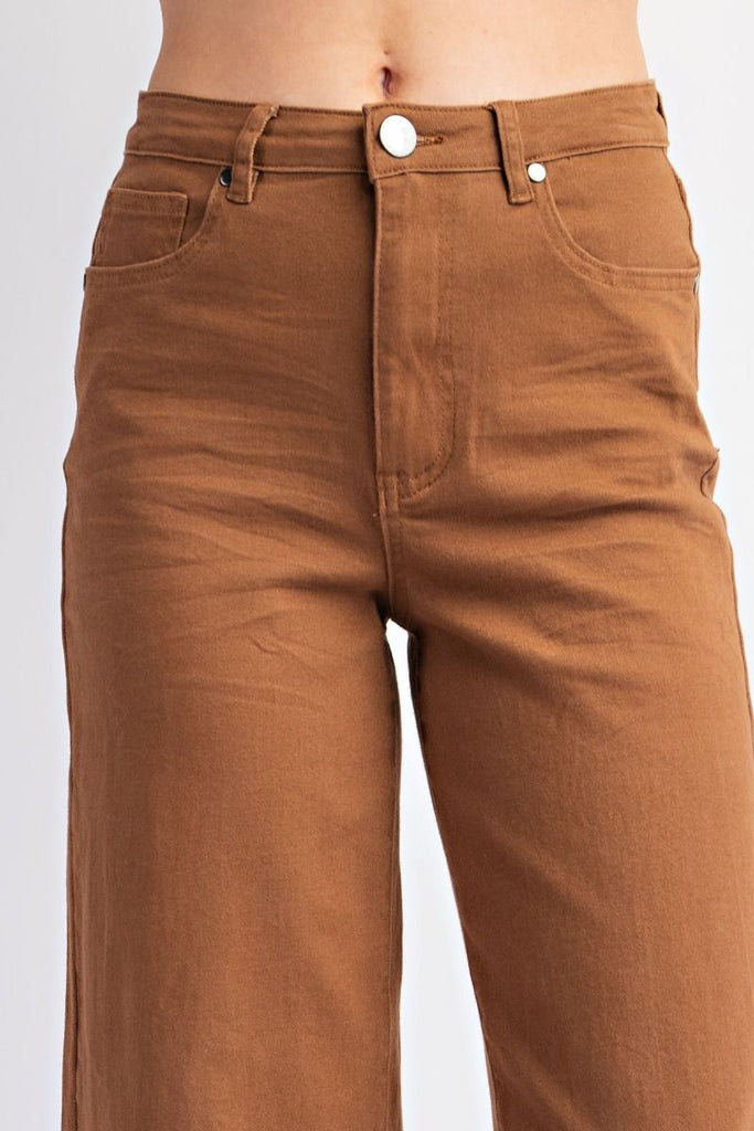 A pair of coffee-colored, high-waisted, wide-leg twill pants with a soft stretch.