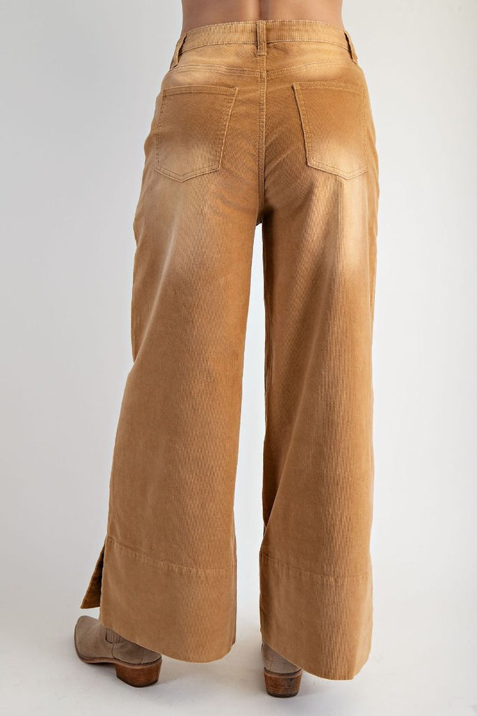 A pair of high-waisted, wide-leg pants in a camel-colored stretch corduroy fabric.