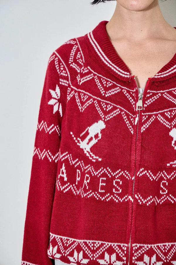 Viatrix red ski Fair Isle zip-up cardigan with white snowflake and skier motifs, featuring a wide collar and a relaxed fit.