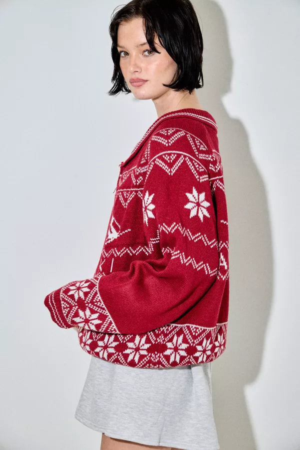 Viatrix red ski Fair Isle zip-up cardigan with white snowflake and skier motifs, featuring a wide collar and a relaxed fit.