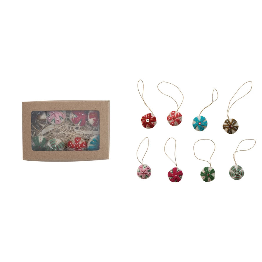 Boxed set of 8 handmade wool felt candy ornaments with colorful embroidery in festive red, green, pink, and blue, displayed with hanging loops.