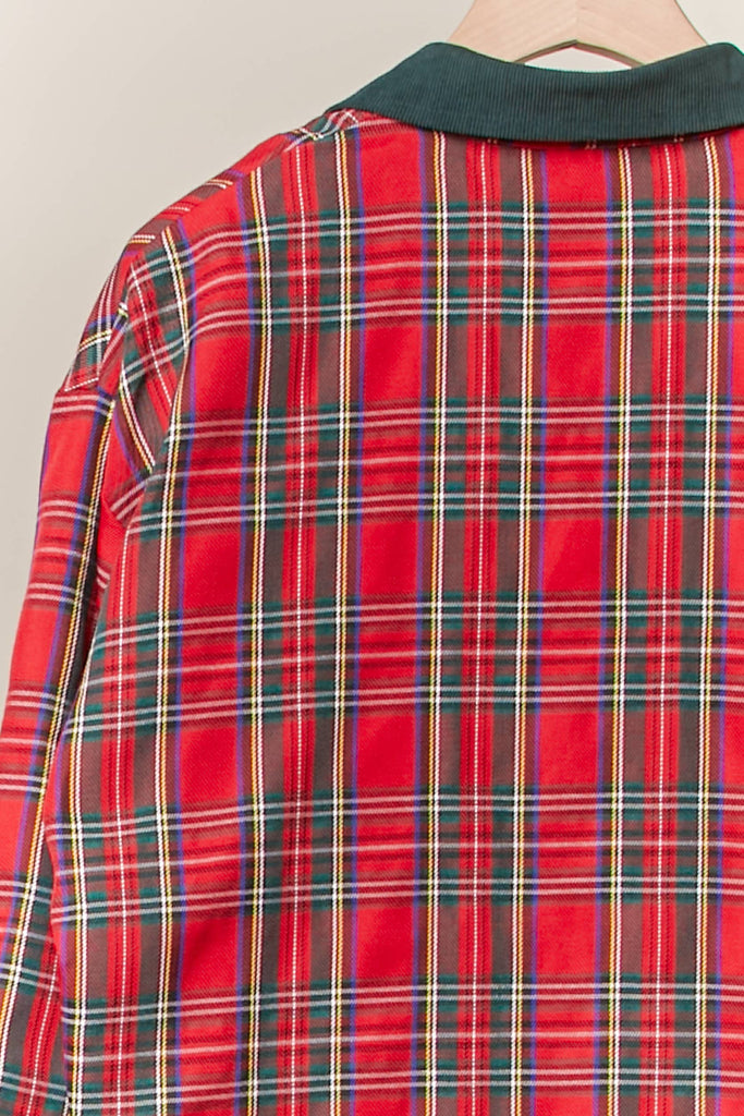 Reversible shacket with red plaid on one side and green corduroy with plaid pockets on the other.
