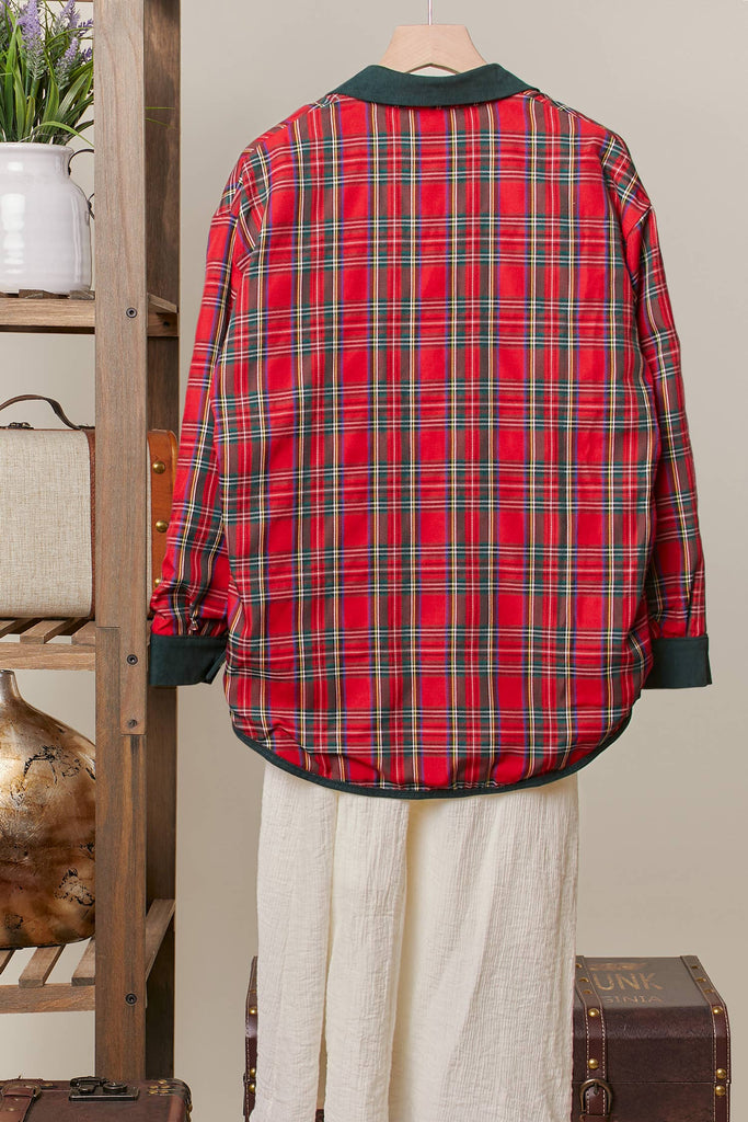 Reversible shacket with red plaid on one side and green corduroy with plaid pockets on the other.