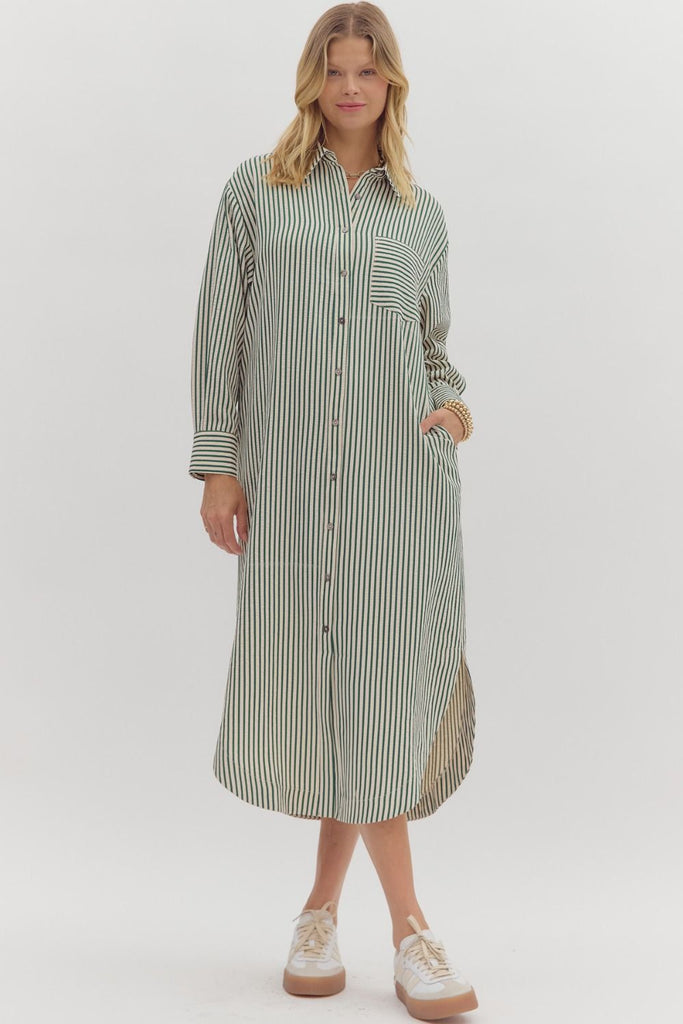 Hunter green textured stripe midi shirt dress with long sleeves, button front, side pockets, and rounded slit hem