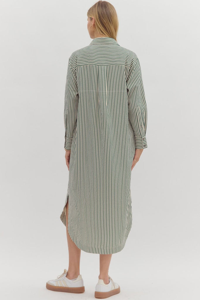 Hunter green textured stripe midi shirt dress with long sleeves, button front, side pockets, and rounded slit hem