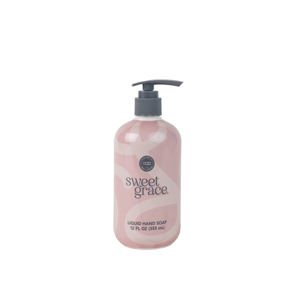 Pink bottle of sweet grace liquid hand soap on a white background