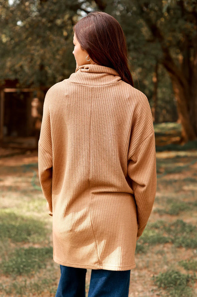 back view of oversize turtleneck sweater