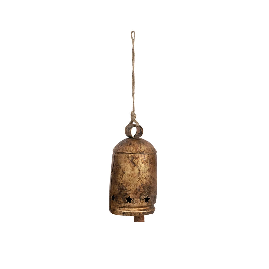 Antique-style metal bell ornament with distressed brass finish, star cut-outs, and jute rope hanger.