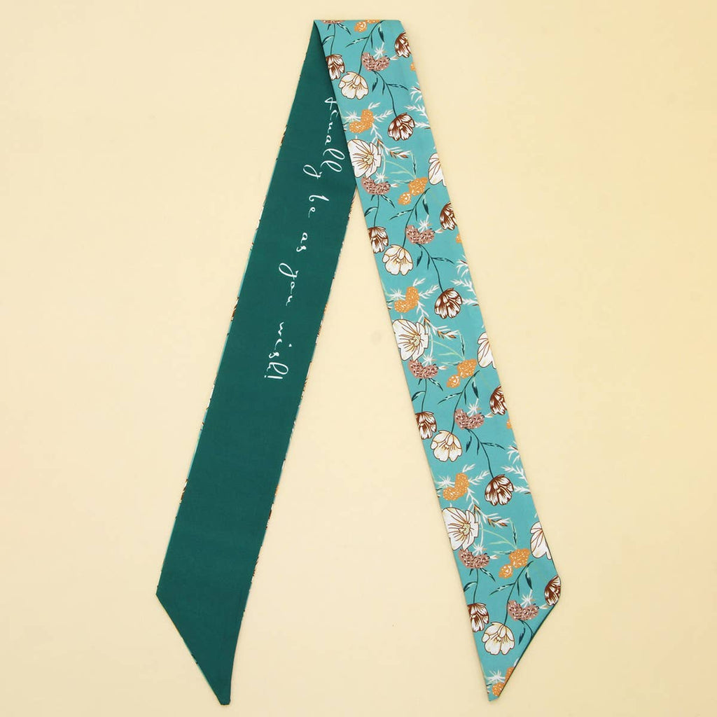 Floral patterned scarf with text on a beige background