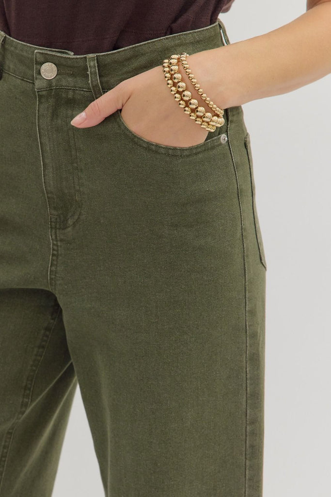 High-rise waist with button and zip fly closure

Cropped, wide-leg silhouette

Floral eyelet embroidery along scalloped hem

Classic front and back jean pockets

Lightweight woven fabric with slight stretch

Unlined and non-sheer