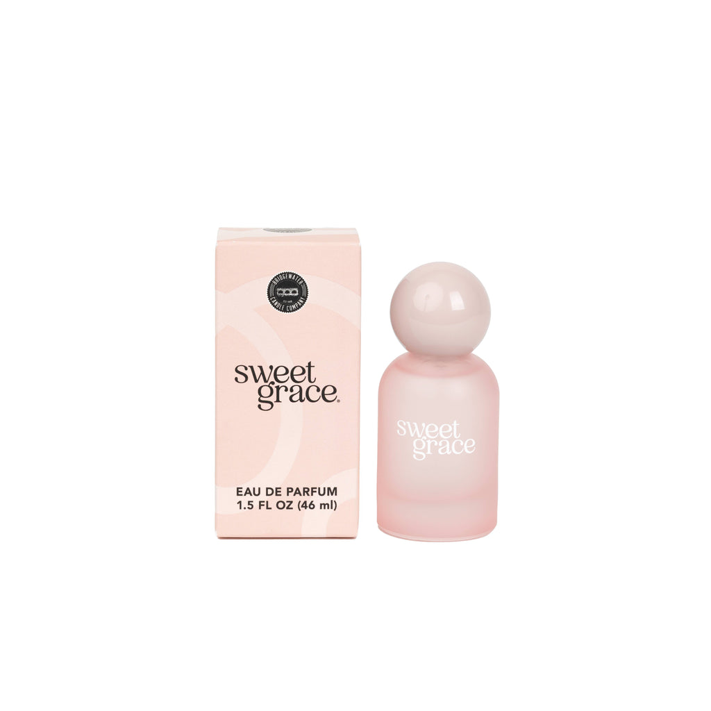 Pink 'sweet grace' eau de parfum bottle and packaging on a white background